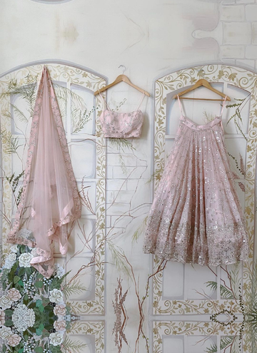 Peachish pink Soft georgette lehenga with thread sequin work.